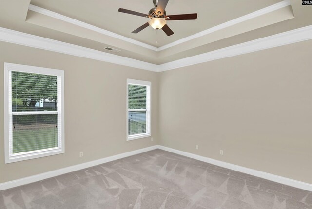 1 Downing Cir, Gilbert, SC 29054 - empty room with a tray ceiling, carpet flooring, baseboards, crown molding, and a ceiling fan