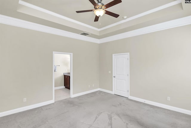 1 Downing Cir, Gilbert, SC 29054 - spare room featuring a raised ceiling, ceiling fan, ornamental molding, baseboards, and light colored carpet