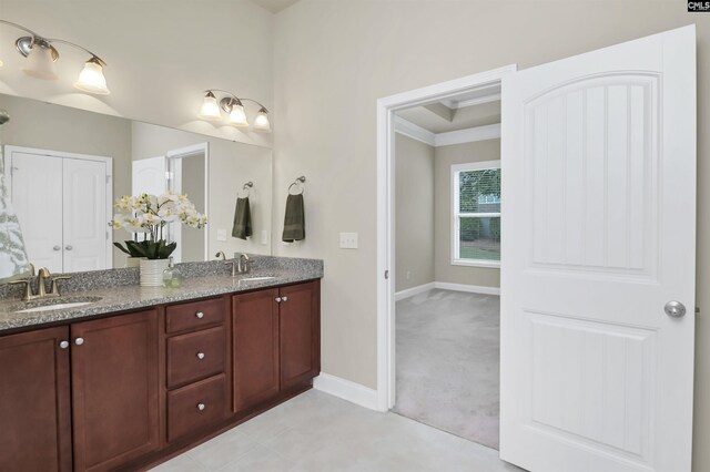 1 Downing Cir, Gilbert, SC 29054 - bathroom featuring baseboards, double vanity, and ornamental molding