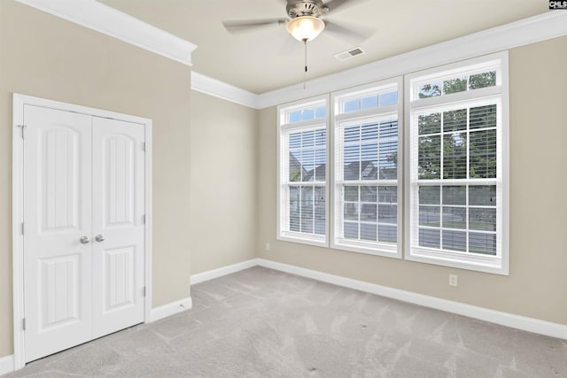 1 Downing Cir, Gilbert, SC 29054 - unfurnished bedroom featuring carpet, baseboards, a closet, ornamental molding, and a ceiling fan