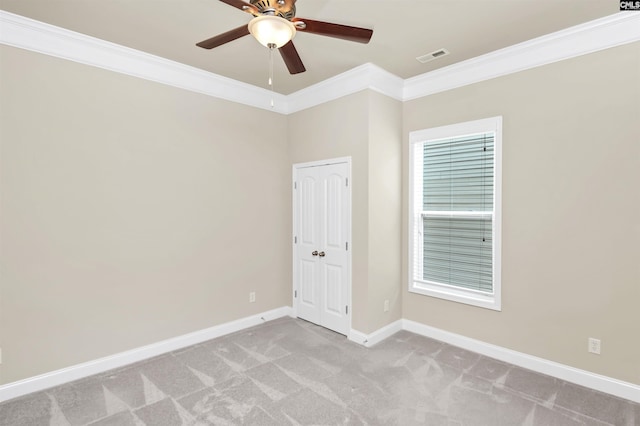 1 Downing Cir, Gilbert, SC 29054 - spare room featuring crown molding, light carpet, baseboards, and a ceiling fan