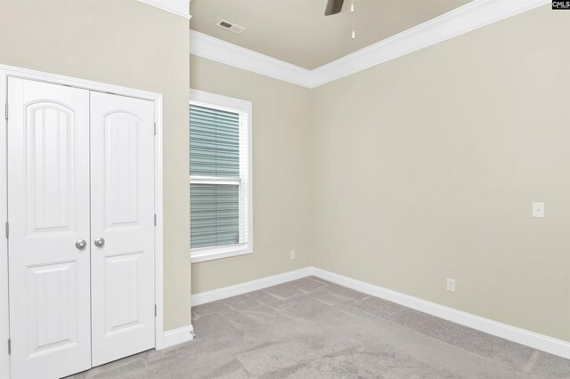 1 Downing Cir, Gilbert, SC 29054 - unfurnished bedroom featuring ornamental molding, carpet floors, a closet, baseboards, and ceiling fan