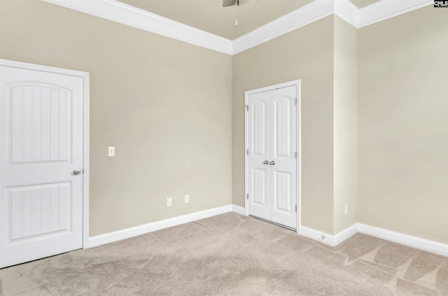 1 Downing Cir, Gilbert, SC 29054 - unfurnished bedroom with crown molding, light colored carpet, baseboards, and a closet