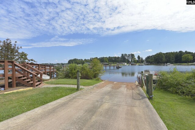 1 Downing Cir, Gilbert, SC 29054 - dock area with a boat ramp, a water view, and a lawn