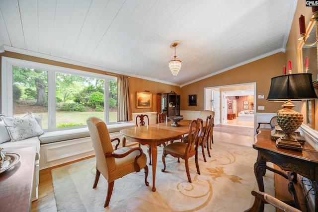 3100 Grace Hill Rd, Columbia, SC 29204 - dining space featuring ornamental molding, light wood-style floors, vaulted ceiling, a wainscoted wall, and wood ceiling
