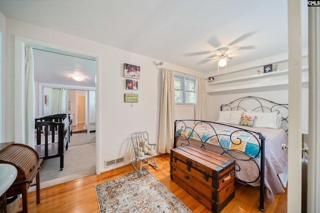 3100 Grace Hill Rd, Columbia, SC 29204 - bedroom with light wood finished floors and ceiling fan