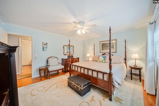 3100 Grace Hill Rd, Columbia, SC 29204 - bedroom featuring ornamental molding, baseboards, wood finished floors, and a textured ceiling