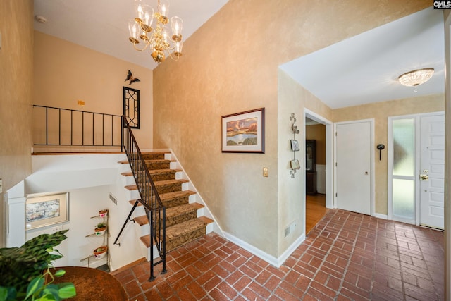 3100 Grace Hill Rd, Columbia, SC 29204 - staircase featuring brick flooring, baseboards, and a chandelier