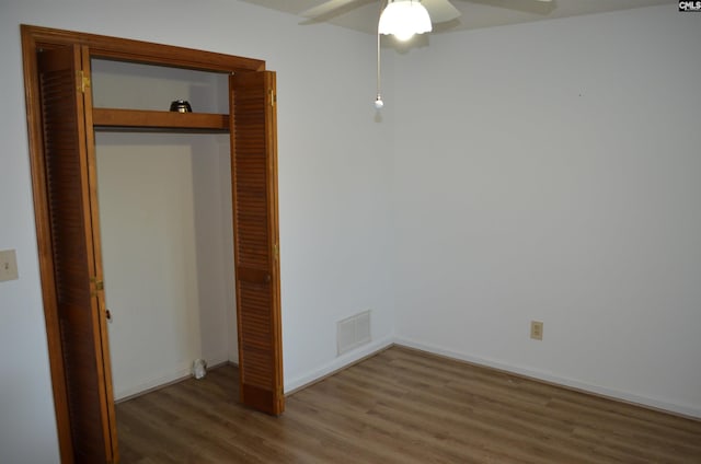 429 Kitti Wake Dr, West Columbia, SC 29170 - unfurnished bedroom with light wood-style flooring, a closet, baseboards, and ceiling fan