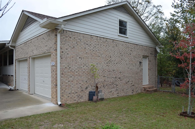 429 Kitti Wake Dr, West Columbia, SC 29170 - view of home's exterior featuring an attached garage, brick siding, concrete driveway, and entry steps