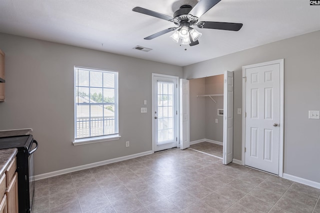513 Scarlet Sage Ln, Columbia, SC 29223 - kitchen featuring black range with electric stovetop, ceiling fan, and baseboards