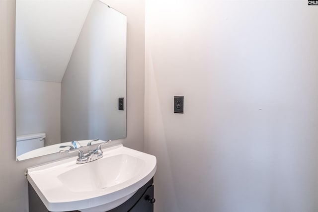 513 Scarlet Sage Ln, Columbia, SC 29223 - half bathroom featuring vaulted ceiling and vanity