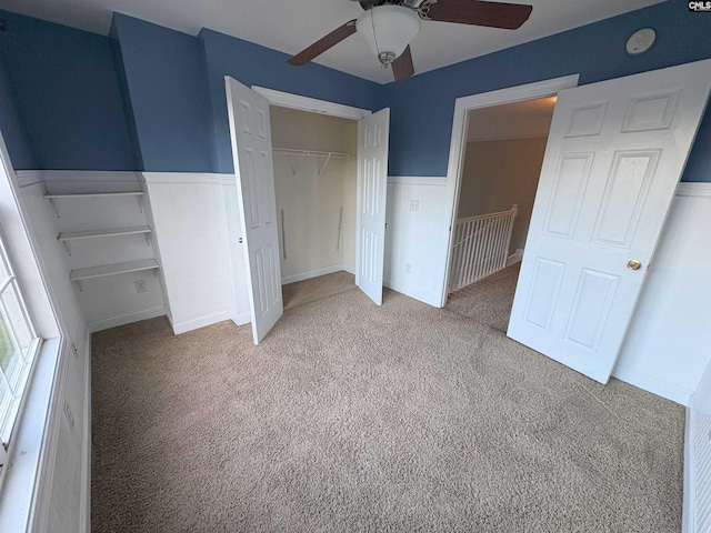 26 Peyton Rd, Columbia, SC 29209 - unfurnished bedroom featuring a closet, wainscoting, light colored carpet, and ceiling fan