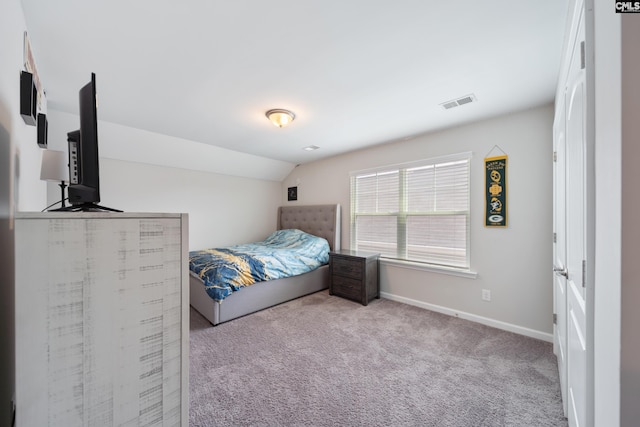 1148 Declaration Dr, Elgin, SC 29045 - bedroom featuring carpet floors, baseboards, and lofted ceiling