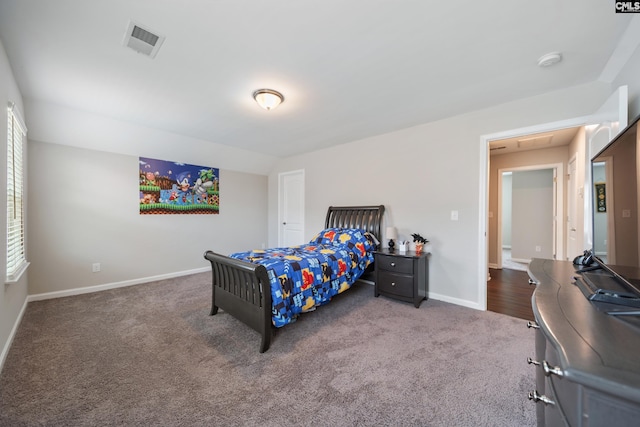 1148 Declaration Dr, Elgin, SC 29045 - bedroom with dark colored carpet and baseboards