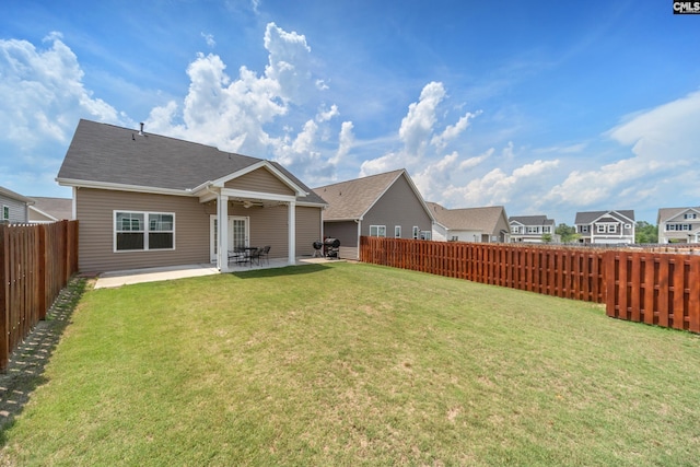1148 Declaration Dr, Elgin, SC 29045 - back of house with a ceiling fan, a patio area, and a shingled roof