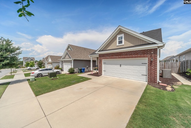1148 Declaration Dr, Elgin, SC 29045 - traditional-style house with brick siding, board and batten siding, driveway, and a garage