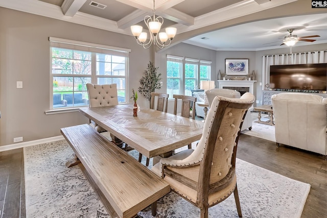 335 Hollow Cove Rd, Chapin, SC 29036 - dining area featuring beamed ceiling, crown molding, wood finished floors, a chandelier, and ceiling fan