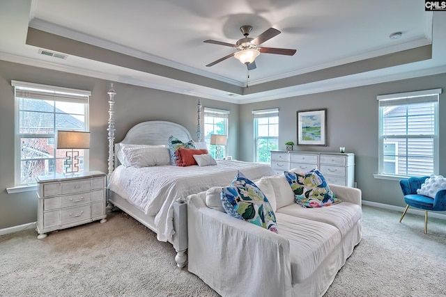 335 Hollow Cove Rd, Chapin, SC 29036 - bedroom featuring a raised ceiling, ornamental molding, carpet, baseboards, and multiple windows