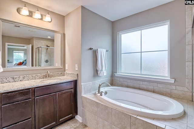 335 Hollow Cove Rd, Chapin, SC 29036 - bathroom with a shower stall, healthy amount of natural light, a bath, and vanity