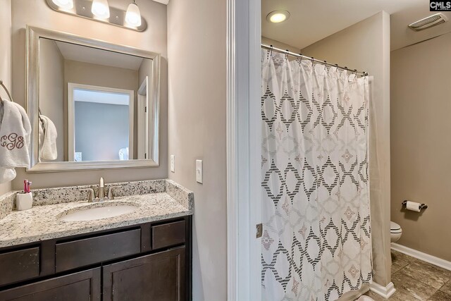335 Hollow Cove Rd, Chapin, SC 29036 - bathroom with toilet, vanity, tile patterned floors, a shower with curtain, and baseboards