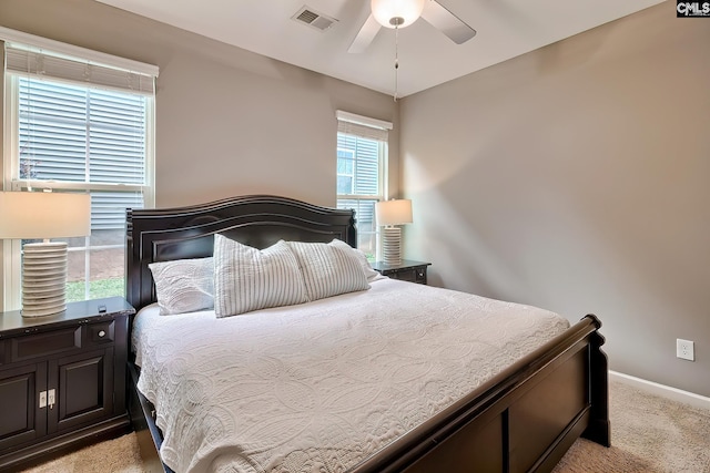 335 Hollow Cove Rd, Chapin, SC 29036 - bedroom with light carpet, baseboards, and a ceiling fan