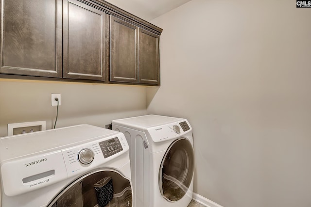 335 Hollow Cove Rd, Chapin, SC 29036 - laundry area with cabinet space, washer and clothes dryer, and baseboards