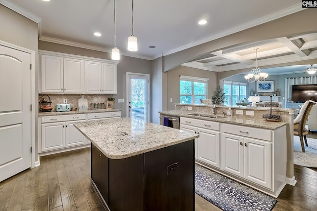 335 Hollow Cove Rd, Chapin, SC 29036 - kitchen with an island with sink, open floor plan, dark wood finished floors, recessed lighting, and beamed ceiling