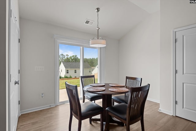 627 Cheehaw Ave, West Columbia, SC 29170 - dining area with light wood-style floors, baseboards, and lofted ceiling