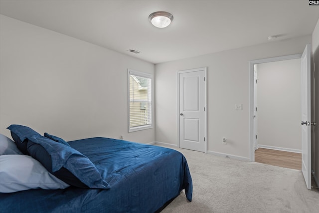 627 Cheehaw Ave, West Columbia, SC 29170 - bedroom featuring baseboards and light colored carpet
