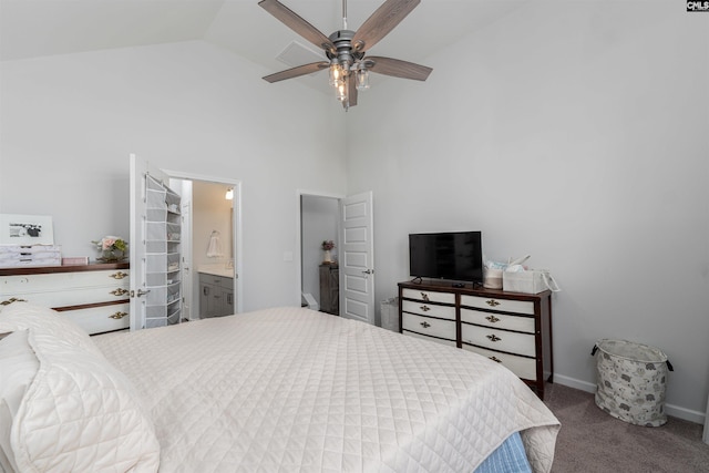 1401 Ardennes Dr, Elgin, SC 29045 - carpeted bedroom featuring high vaulted ceiling, baseboards, ceiling fan, and ensuite bath