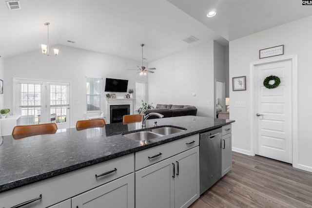 1401 Ardennes Dr, Elgin, SC 29045 - kitchen featuring a sink, stainless steel dishwasher, a fireplace, open floor plan, and ceiling fan