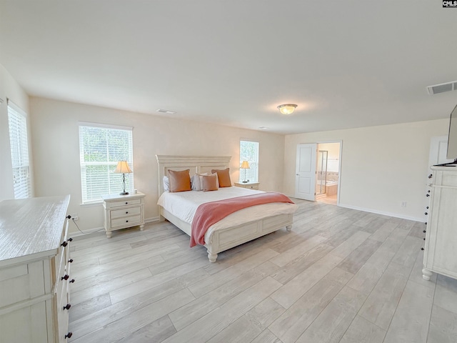 121 Ashford Way, Lexington, SC 29072 - bedroom with light wood-type flooring, multiple windows, and baseboards