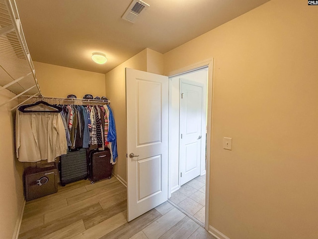 121 Ashford Way, Lexington, SC 29072 - spacious closet featuring wood finished floors