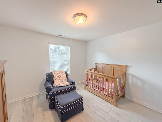 121 Ashford Way, Lexington, SC 29072 - bedroom featuring light wood-style flooring and baseboards