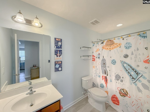 121 Ashford Way, Lexington, SC 29072 - bathroom featuring toilet, vanity, baseboards, and a shower with curtain