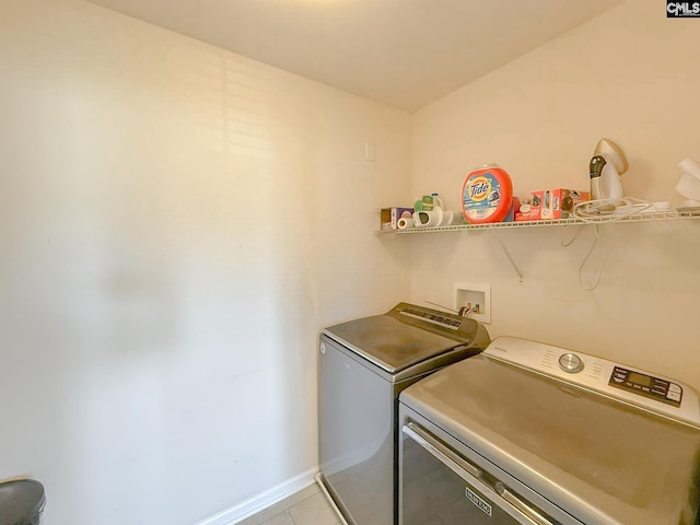 121 Ashford Way, Lexington, SC 29072 - washroom with washing machine and dryer, light tile patterned floors, and baseboards