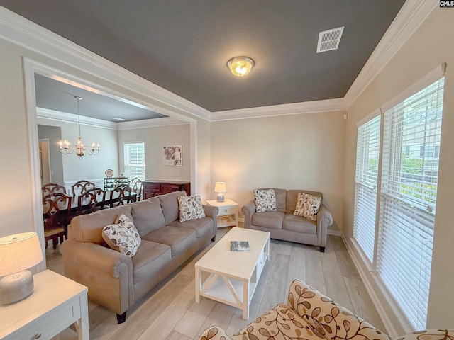 121 Ashford Way, Lexington, SC 29072 - living room featuring a chandelier, plenty of natural light, light wood finished floors, and crown molding