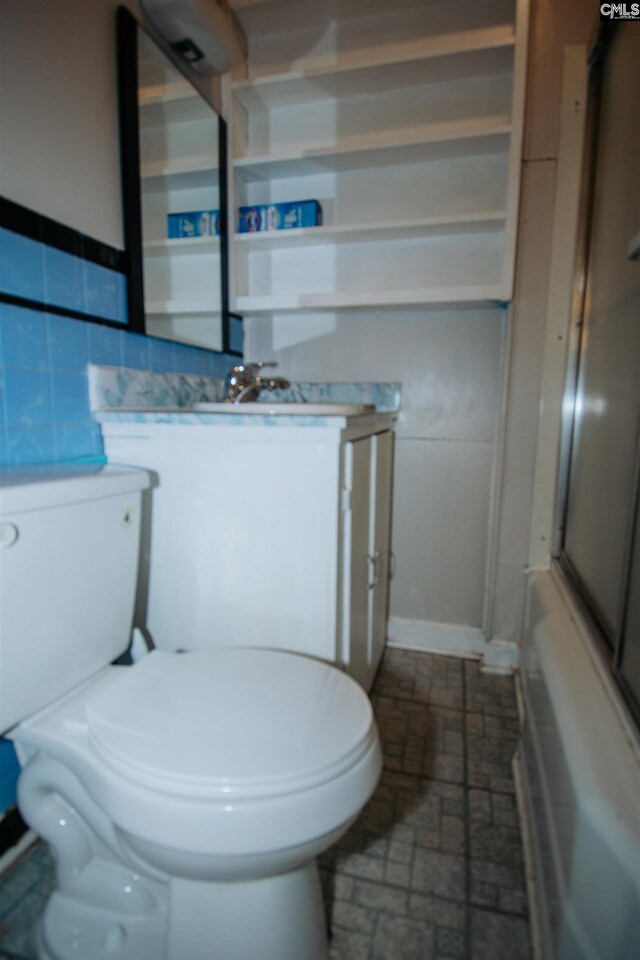 5199 Bethune Rd, Kershaw, SC 29067 - bathroom with toilet, vanity, and baseboards