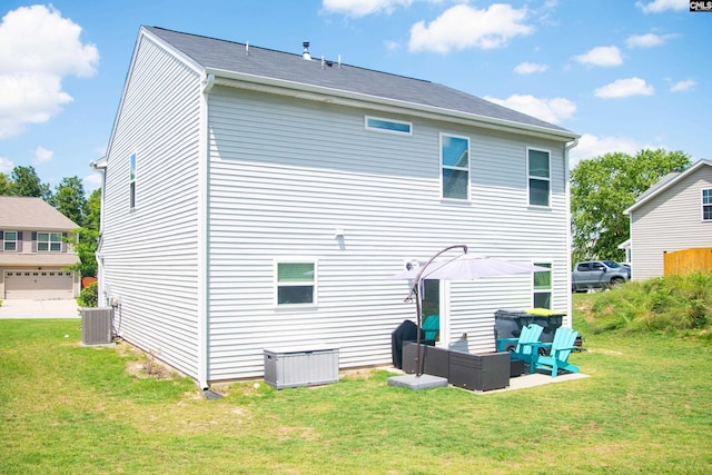 268 Drooping Leaf Rd, Lexington, SC 29072 - back of house featuring outdoor lounge area, central AC unit, and a lawn