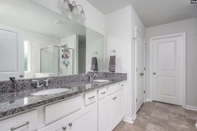 646 Penfolds Way, Blythewood, SC 29016 - full bath with baseboards, a stall shower, and double vanity