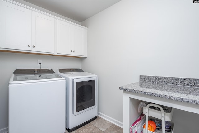 646 Penfolds Way, Blythewood, SC 29016 - laundry area with cabinet space, independent washer and dryer, and baseboards