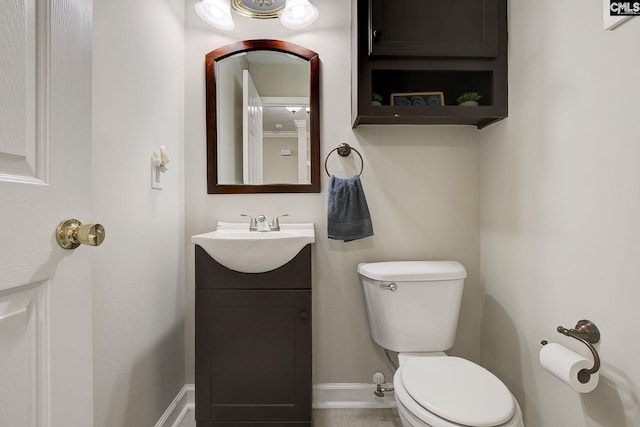 220 Pine Grove Rd, Lugoff, SC 29078 - bathroom with toilet, vanity, and baseboards