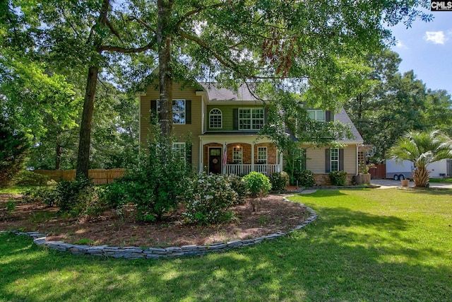 220 Pine Grove Rd, Lugoff, SC 29078 - traditional-style house featuring brick siding and a porch