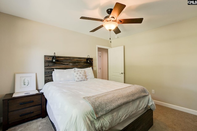 220 Pine Grove Rd, Lugoff, SC 29078 - bedroom with carpet flooring, baseboards, and ceiling fan