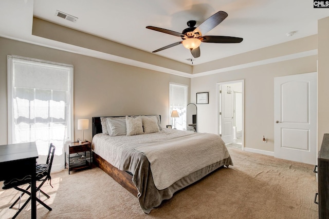 220 Pine Grove Rd, Lugoff, SC 29078 - bedroom featuring light colored carpet, baseboards, ceiling fan, and ensuite bathroom