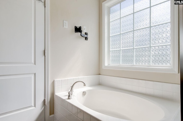 220 Pine Grove Rd, Lugoff, SC 29078 - bathroom featuring a garden tub and healthy amount of natural light