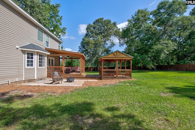 220 Pine Grove Rd, Lugoff, SC 29078 - view of yard featuring a gazebo, an outdoor fire pit, and a patio area