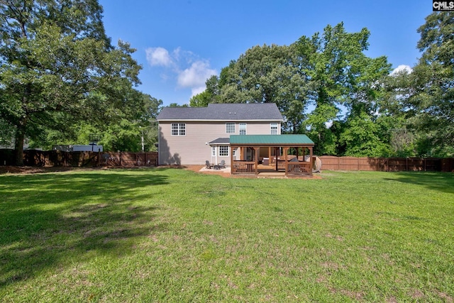 220 Pine Grove Rd, Lugoff, SC 29078 - back of property with a patio and metal roof