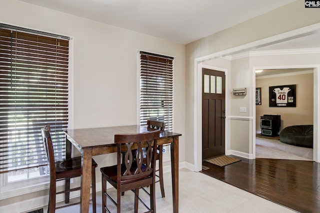 220 Pine Grove Rd, Lugoff, SC 29078 - dining space with healthy amount of natural light, baseboards, and crown molding